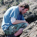Image of student collecting fossils