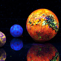 Image of marbles made from fluorescent minerals