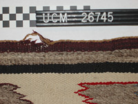 Image of front of Navajo rug before repair