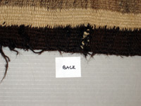 Image of back of Navajo rug before repair