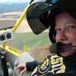 Image of MFS student in a small airplane