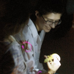 Thumbnail image of student holding lizard at GLOW SHOW event