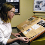 Image of female MFS student in an exhibit